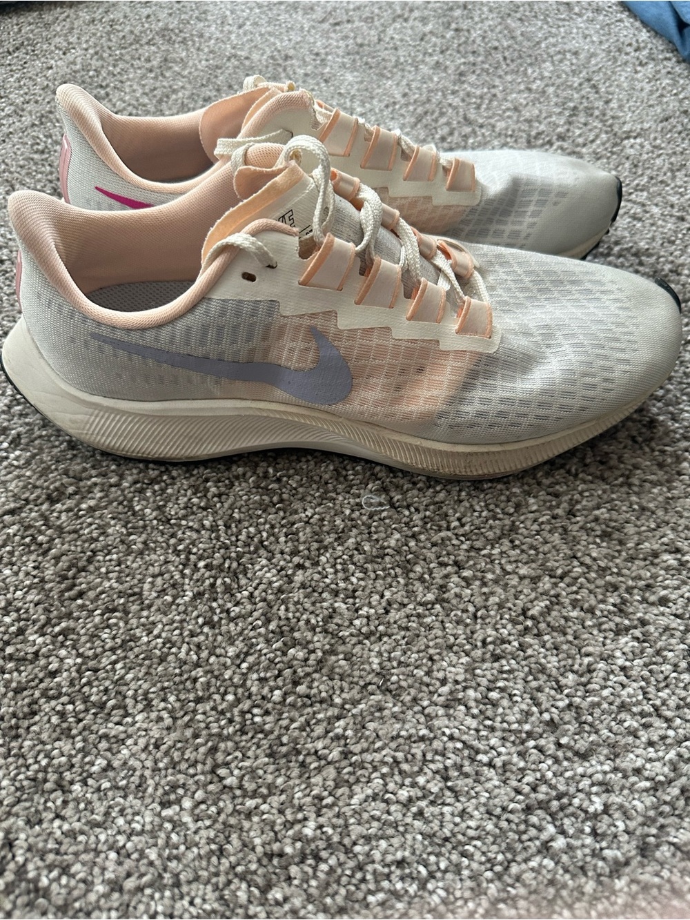 Nike Women's White Running Shoes with Pale Pink and Lilac Accents
